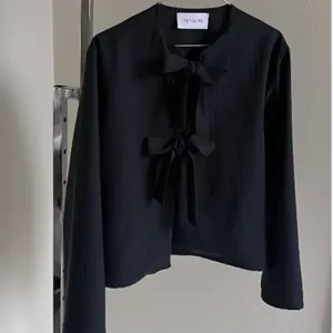 Black blouse sewn from deadstock material Handmade Danish Women’s Clothing